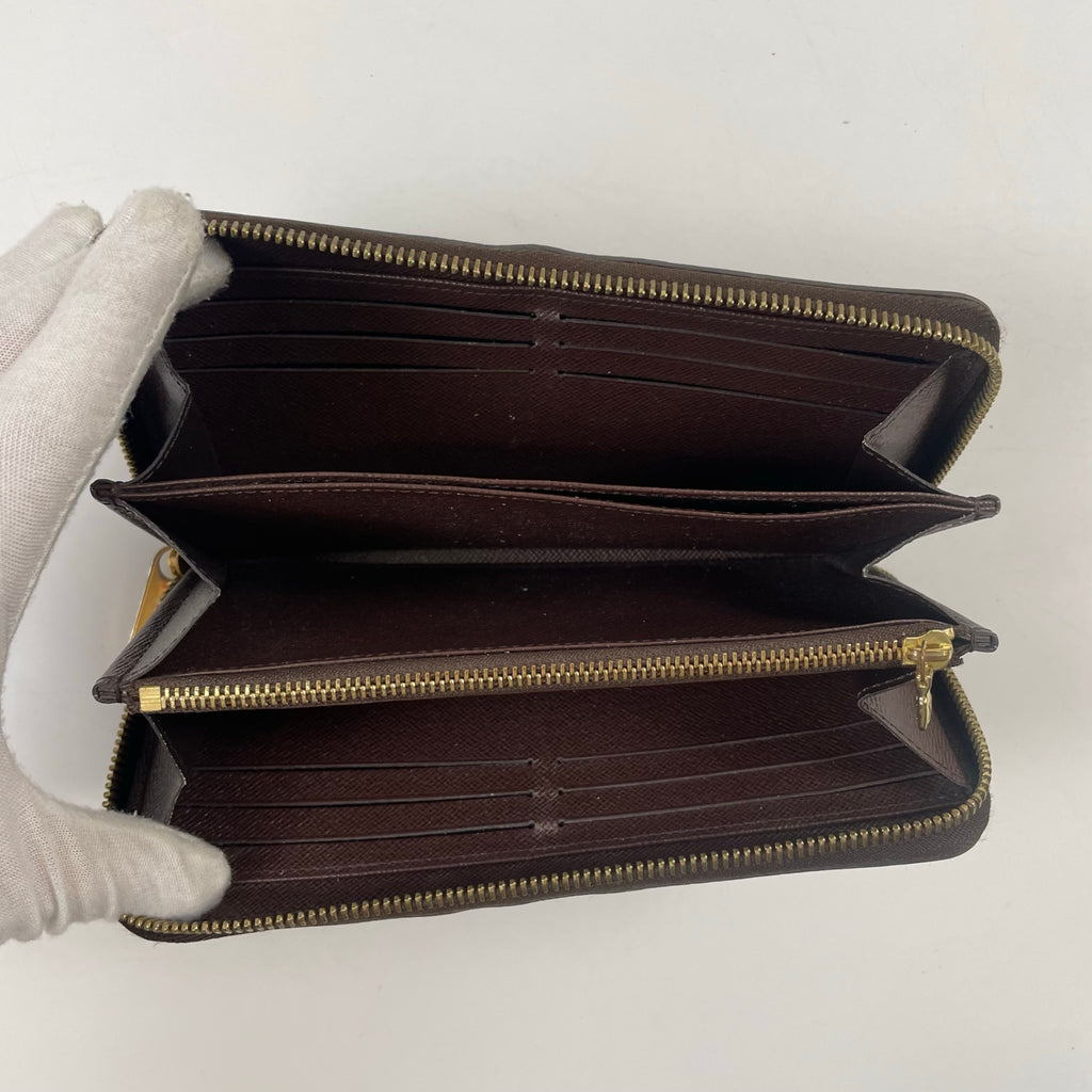 LOUIS VUITTON / ジッピーウォレット N60015 CA0197 参考定価：120,000程度