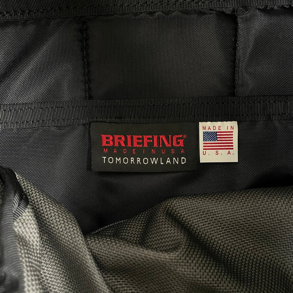 BRIEFING × TOMORROW LAND / 別注 FLAP PACK グレー×ブラック 参考定価：40,000程度