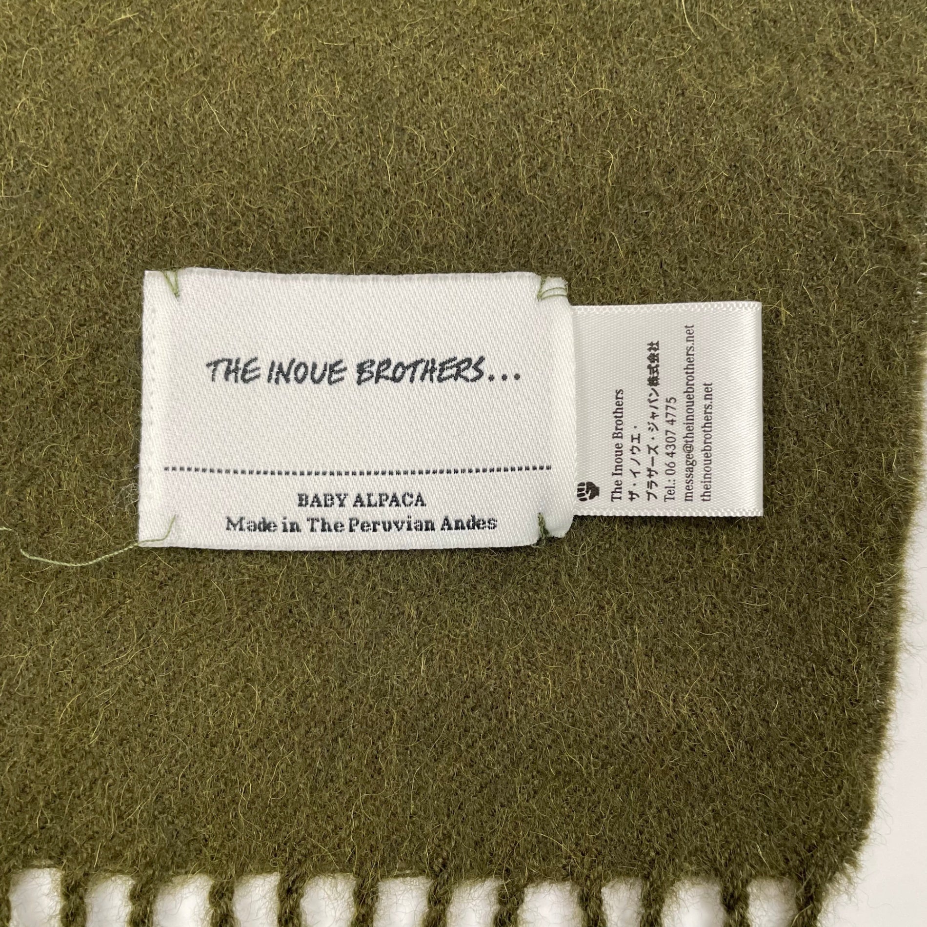 THE INOUE BROTHERS ザ イノウエ ブラザーズ / ベビーアルパカマフラー オリーブ 参考定価：15,000+tax SIZE：35×180cm