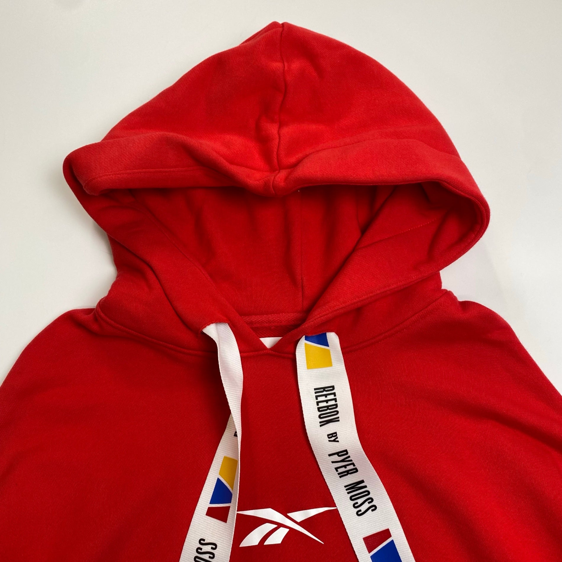 REEBOK × PYER MOSS リーボック パイアー モス / コラボ クロップド プルオーバーパーカー 参考定価：19,000+tax SIZE:M