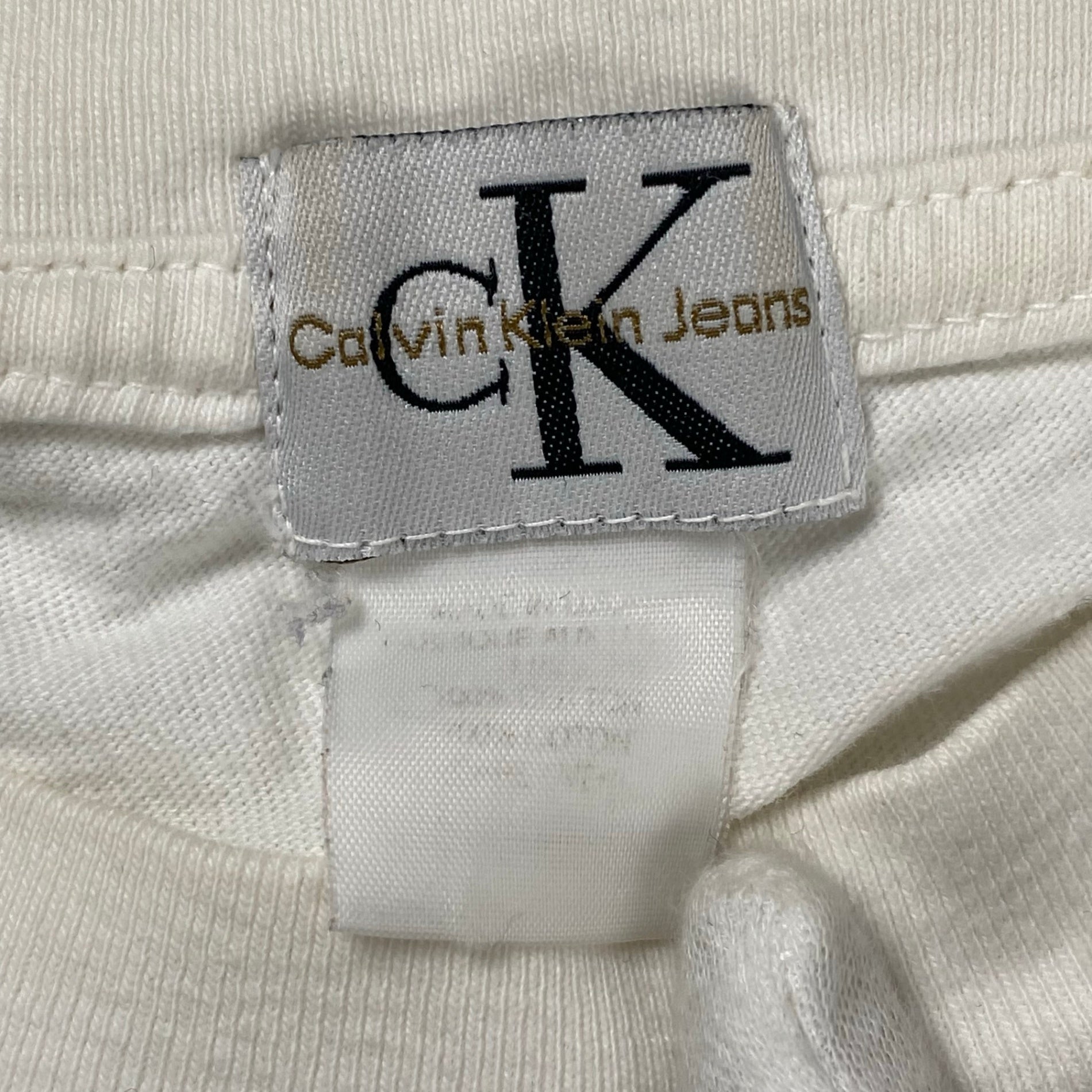 90s ck CALVIN KLEIN jeans カルバンクライン ジーンズ / CKロゴ ヴィンテージ 長袖Tシャツ ユニセックス ホワイト SIZE:M程度