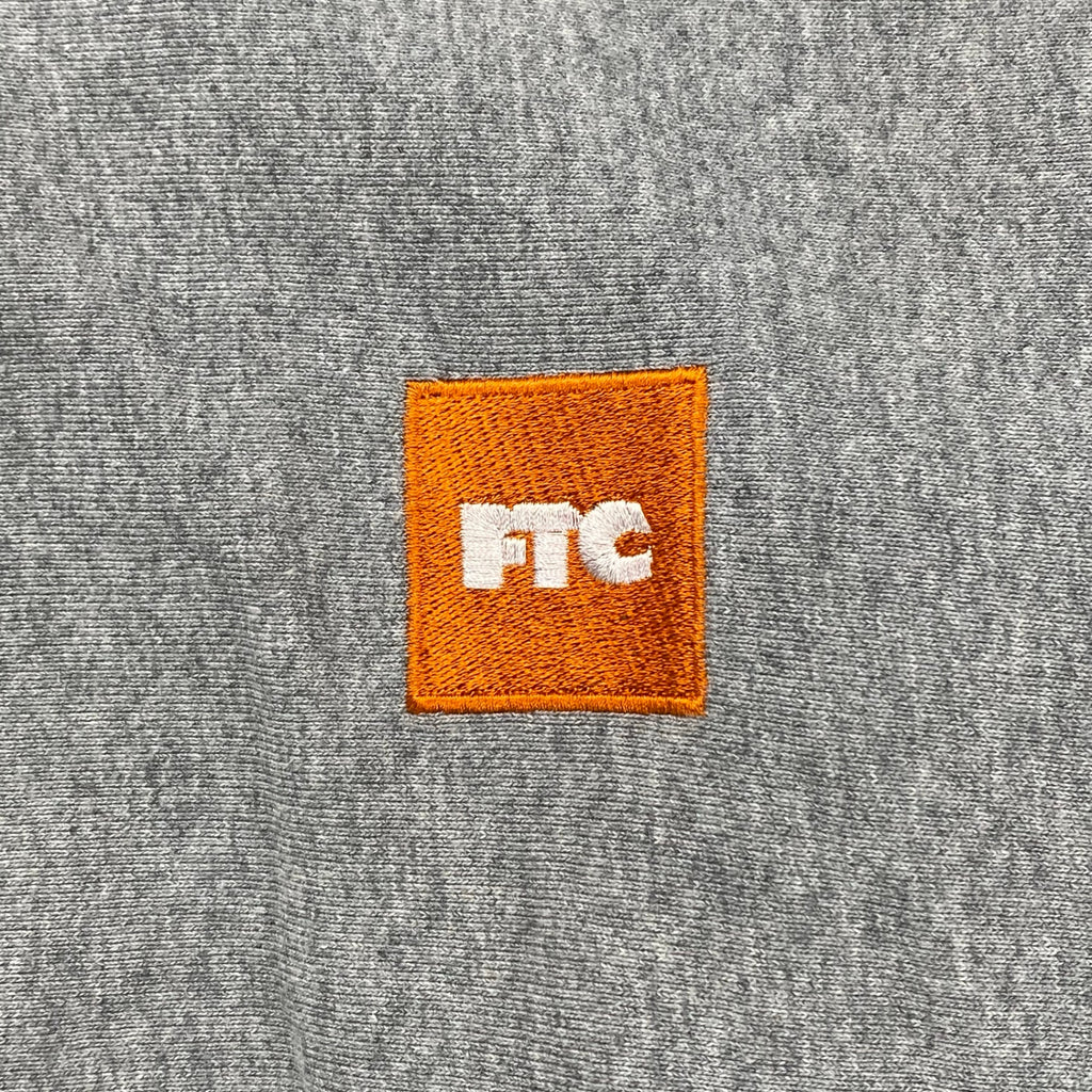 FTC エフティーシー / ボックスロゴ フーディ パーカー オレンジ×グレー SIZE:M