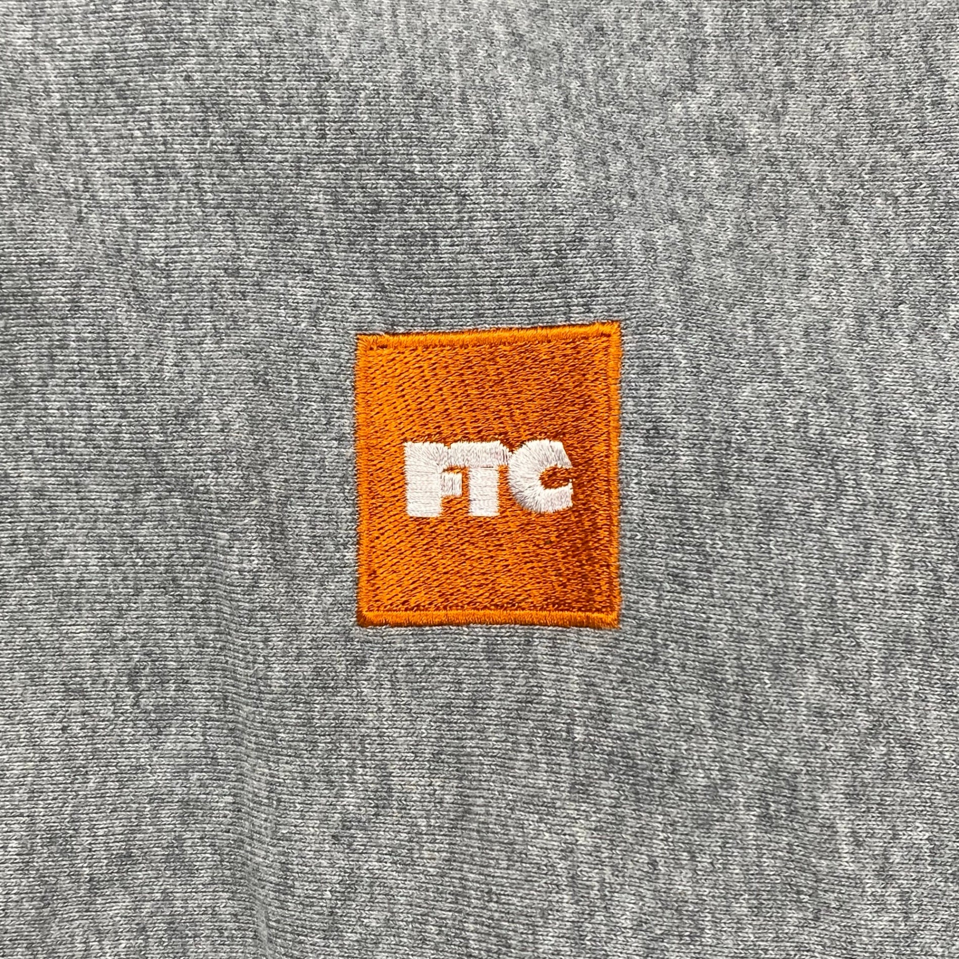 FTC エフティーシー / ボックスロゴ フーディ パーカー オレンジ×グレー SIZE:M